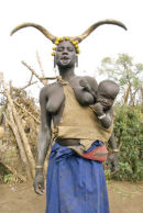 Mursi woman and child
